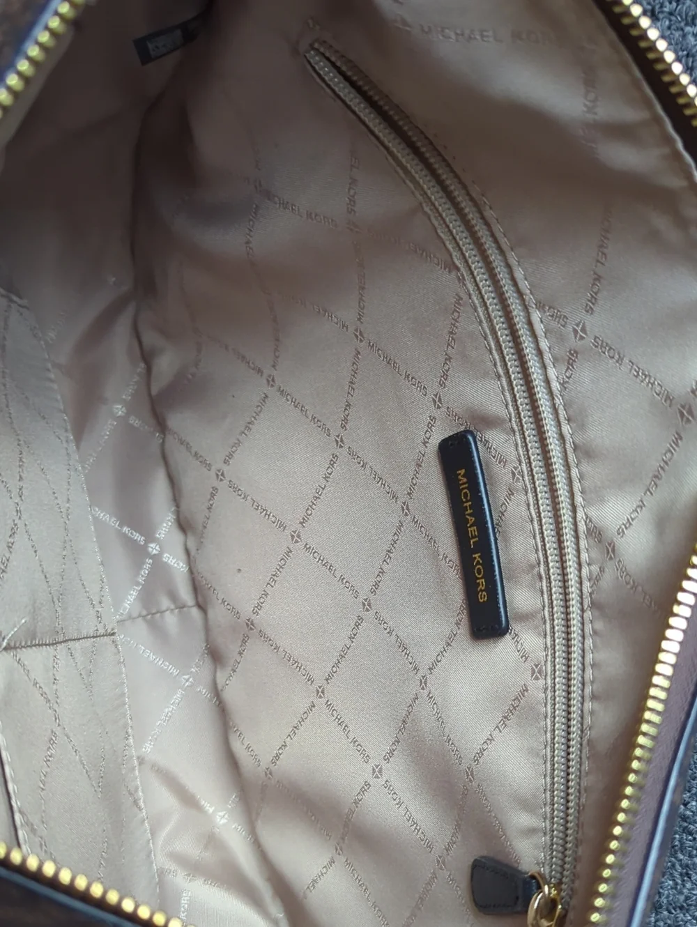 Michael Kors used inside